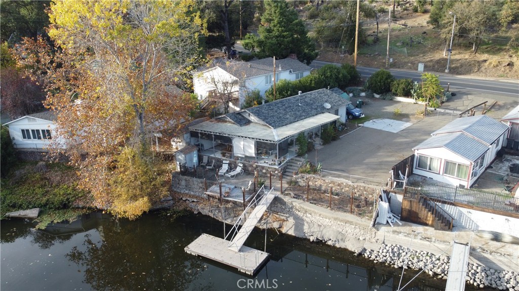 16061 Dam Road Clearlake, CA 95422 - Photo 1 of 37 an aerial view of a house with garden space and street view