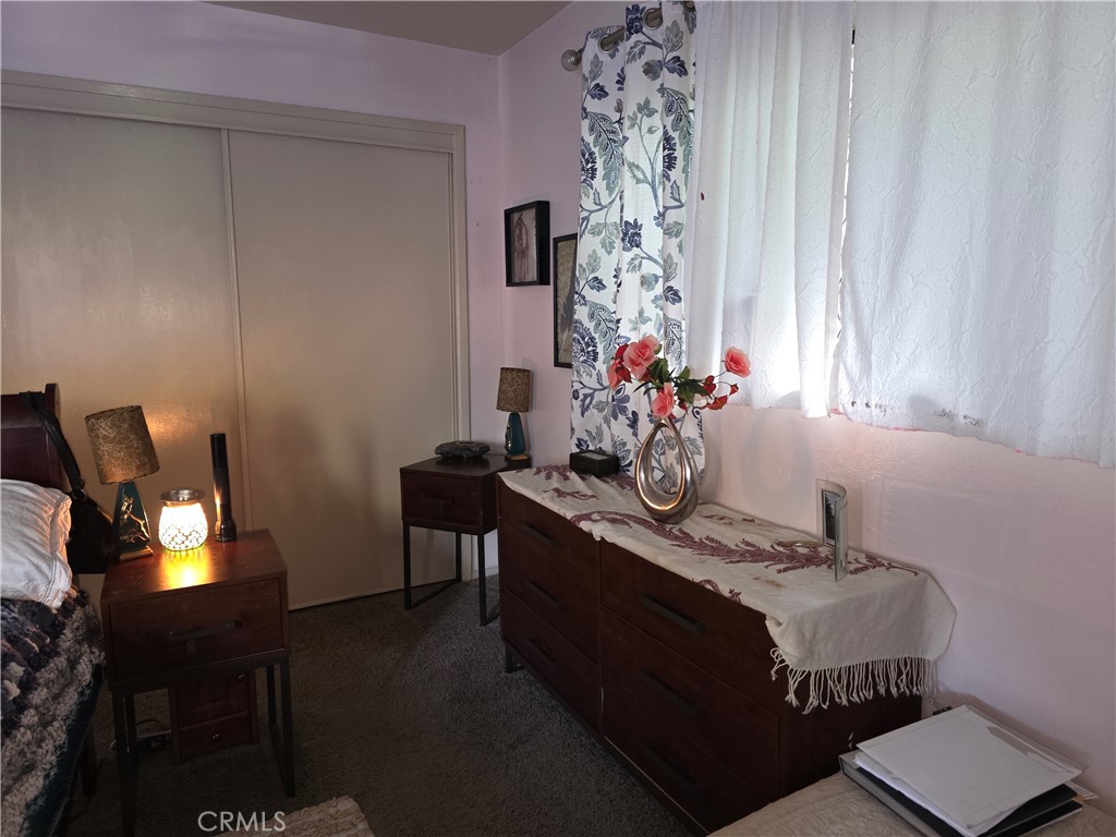 16061 Dam Road Clearlake, CA 95422 - Photo 18 of 37 a room with a table chair and a window