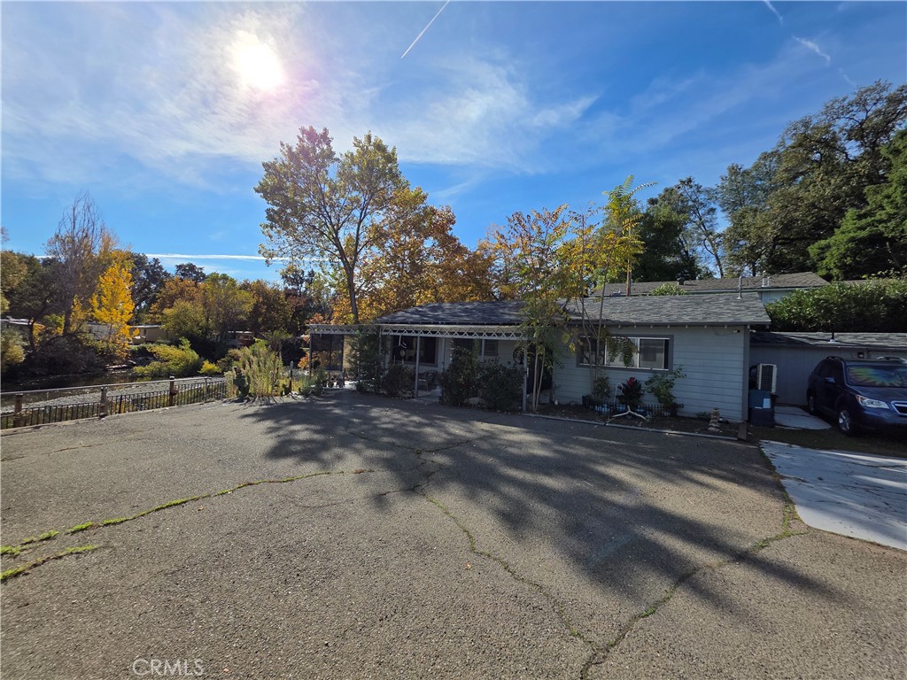 16061 Dam Road Clearlake, CA 95422 - Photo 3 of 37 a view of house with outdoor space and sitting area