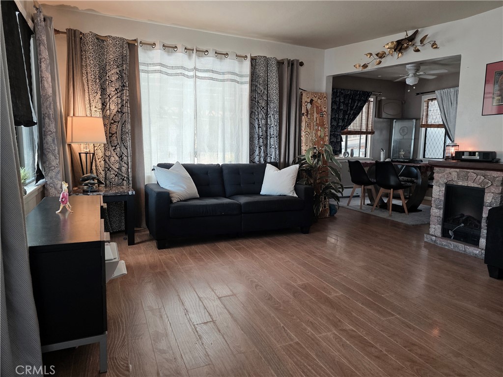 16061 Dam Road Clearlake, CA 95422 - Photo 10 of 37 a living room with furniture a fireplace and a flat screen tv