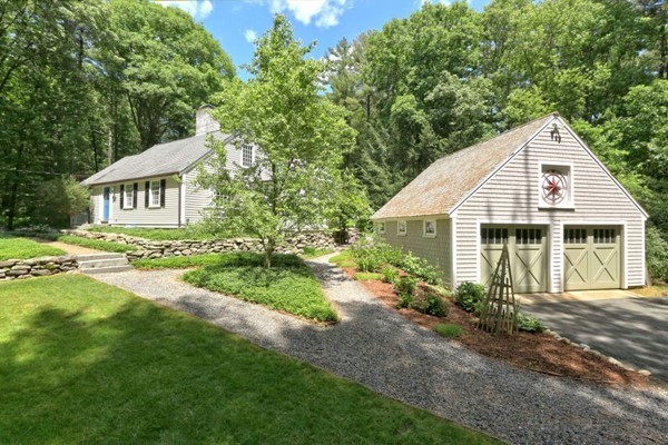 28 Sears Road Wayland, MA 01778 - Photo 1 of 30 a view of a house with backyard and garden