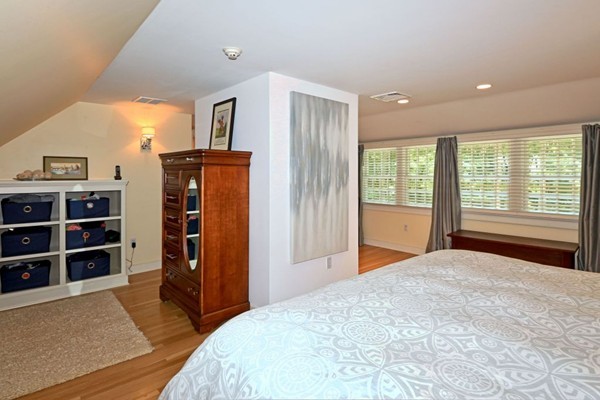 28 Sears Road Wayland, MA 01778 - Photo 20 of 30 a bedroom with a dresser and a large window