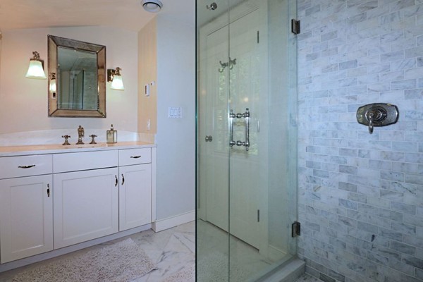 28 Sears Road Wayland, MA 01778 - Photo 22 of 30 a bathroom with a sink and a mirror