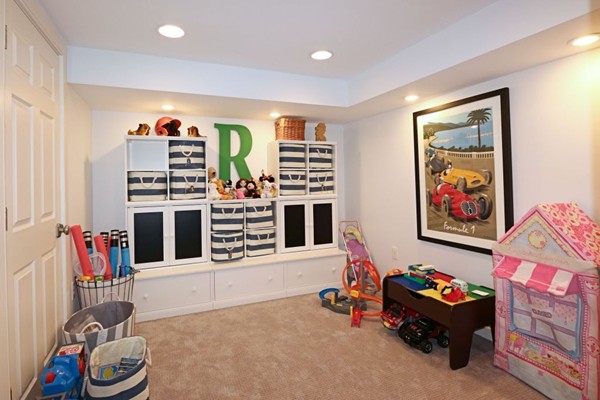 28 Sears Road Wayland, MA 01778 - Photo 29 of 30 a living room with furniture and a flat screen tv