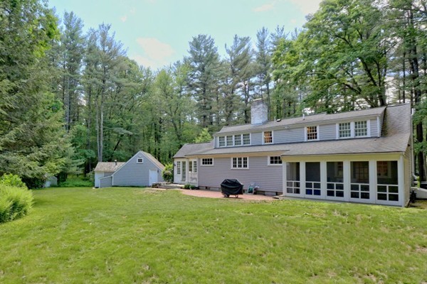 28 Sears Road Wayland, MA 01778 - Photo 3 of 30 a view of house with yard and entertaining space