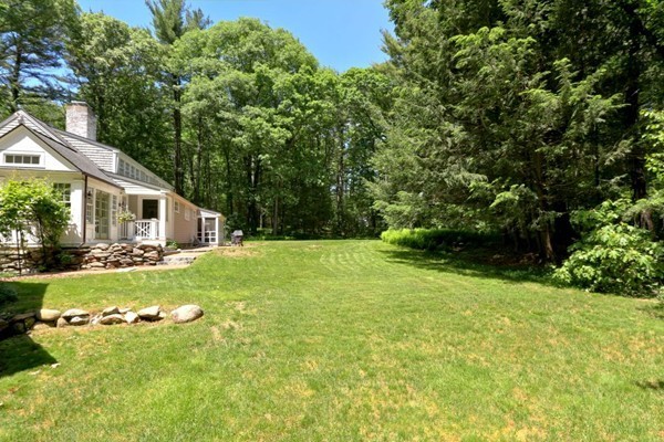 28 Sears Road Wayland, MA 01778 - Photo 4 of 30 a view of backyard of house with green space