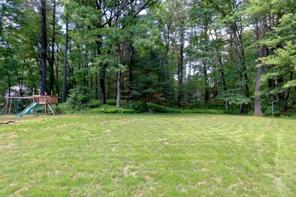28 Sears Road Wayland, MA 01778 - Photo 5 of 30 a view of a backyard with a patio