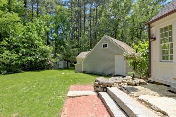 28 Sears Road Wayland, MA 01778 - Photo 6 of 30 a front view of a house with a yard