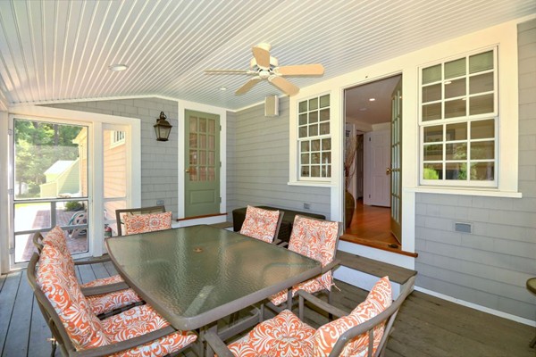 28 Sears Road Wayland, MA 01778 - Photo 8 of 30 a view of a dining room with furniture and wooden floor