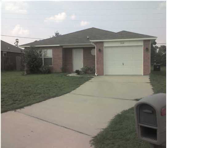 208 Limestone Circle Crestview, FL 32539 - Photo 1 of 20 a front view of a house with a yard
