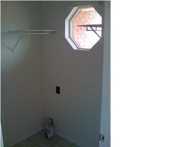 208 Limestone Circle Crestview, FL 32539 - Photo 13 of 20 a bathroom with a window