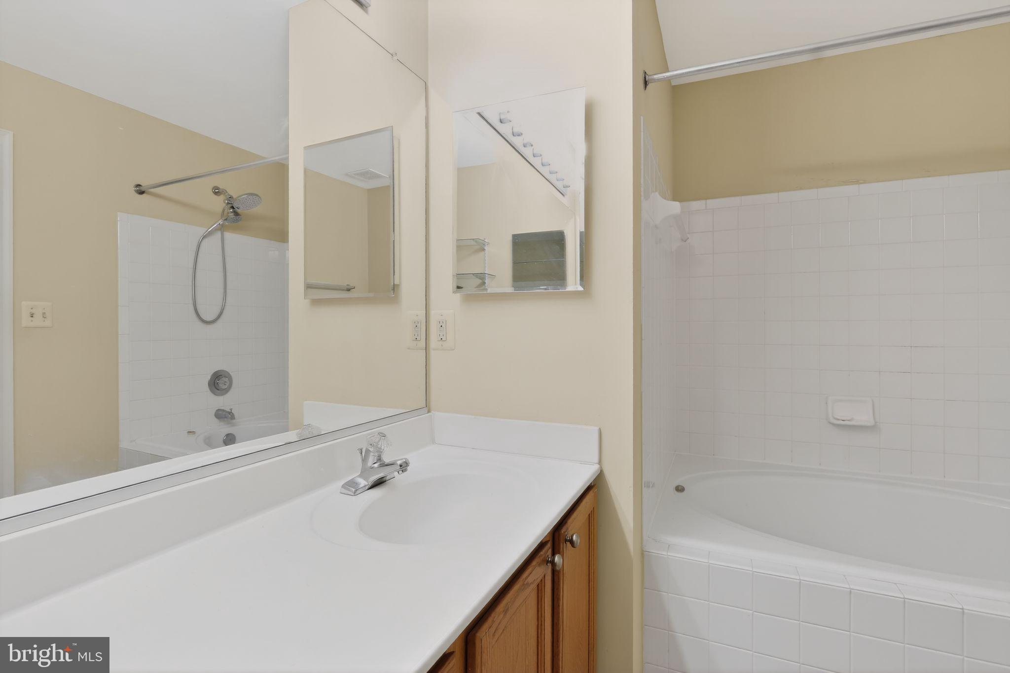 6348 Dakine Circle Springfield, VA 22150 - Photo 31 of 35 a bathroom with a bathtub and a sink