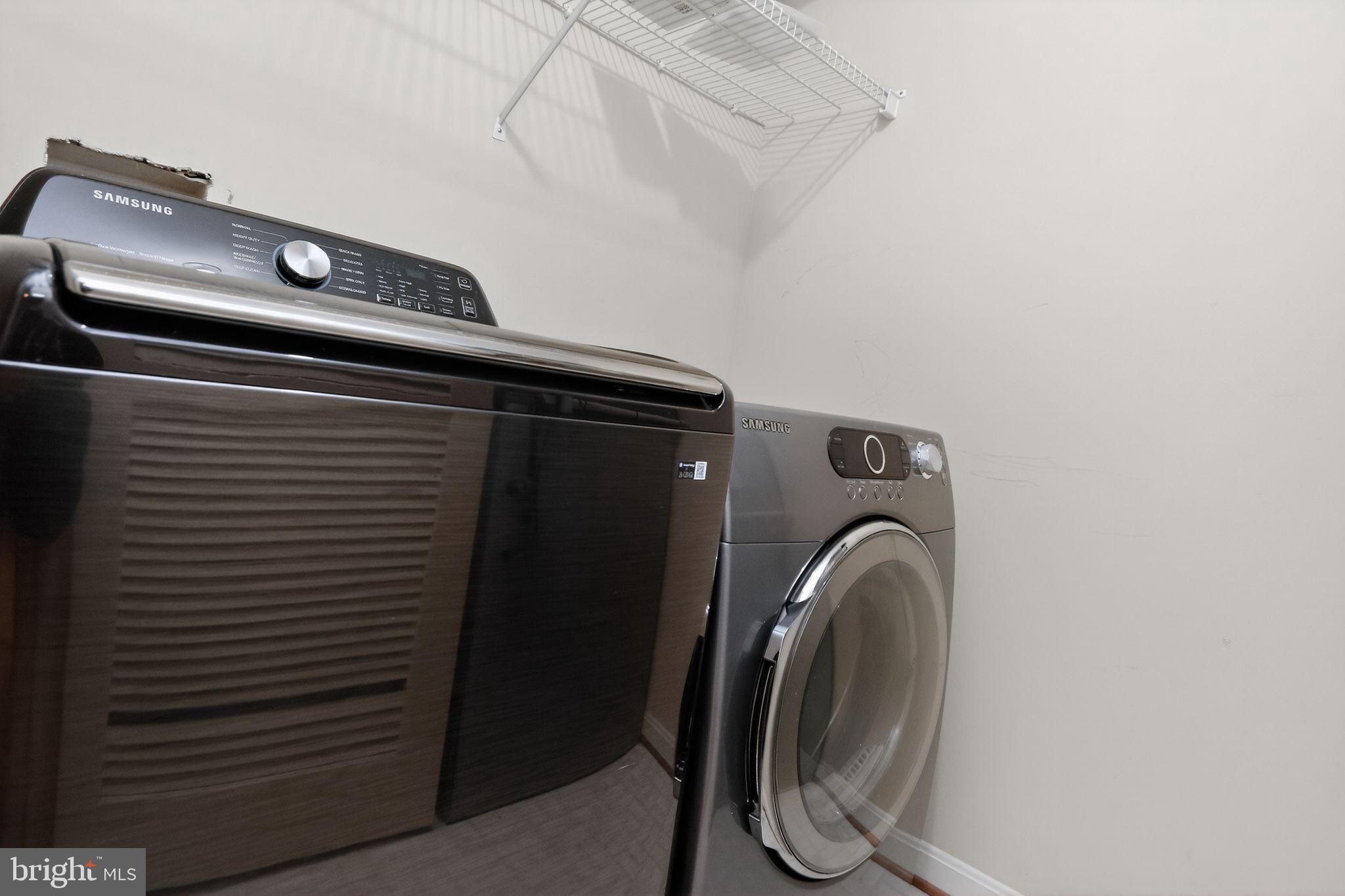 6348 Dakine Circle Springfield, VA 22150 - Photo 34 of 35 a utility room with dryer and washer
