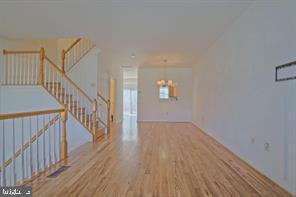 6348 Dakine Circle Springfield, VA 22150 - Photo 6 of 35 a view of entryway with wooden floor