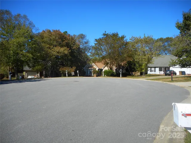 a view of road with trees