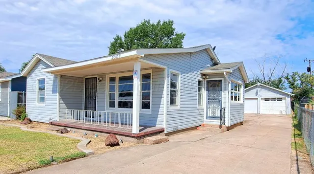 front view of a house with a patio