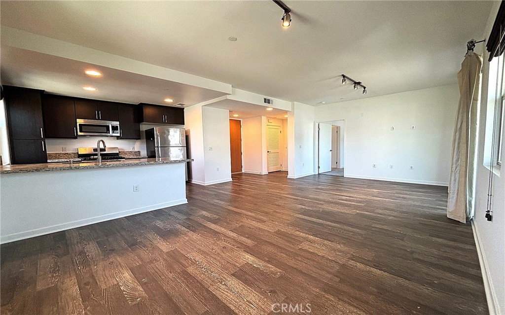 612 East Carson Street, Unit 303 Carson, CA 90745 - Photo 12 of 51 a view of kitchen and microwave