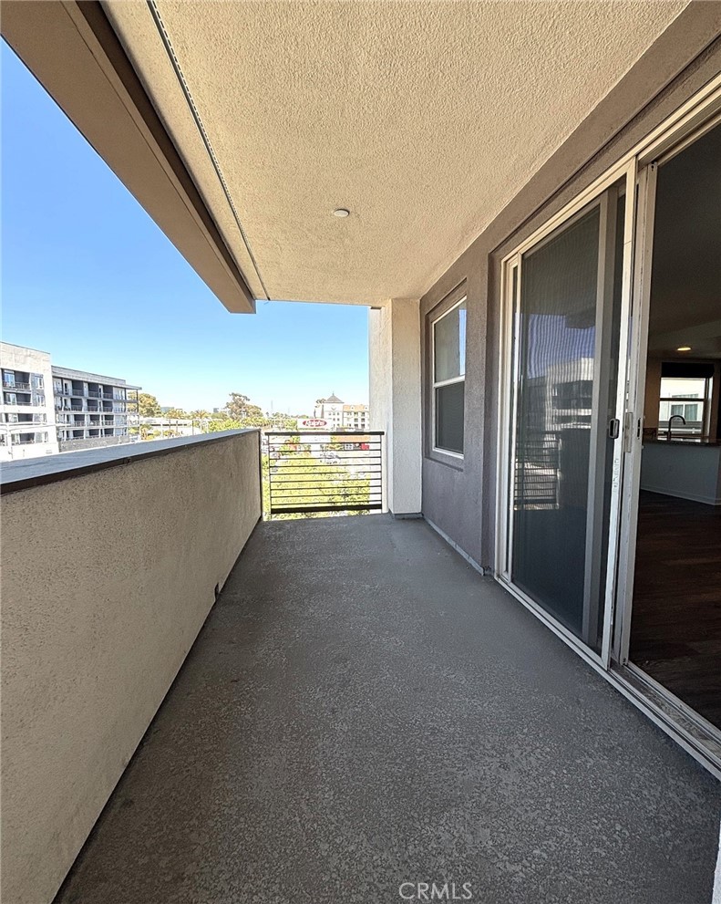 612 East Carson Street, Unit 303 Carson, CA 90745 - Photo 26 of 51 a view of a living room with a large window