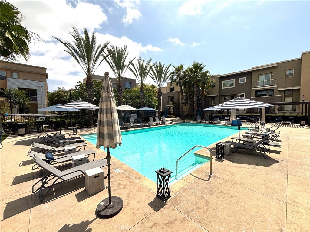 612 East Carson Street, Unit 303 Carson, CA 90745 - Photo 30 of 51 a view of a backyard with sitting area