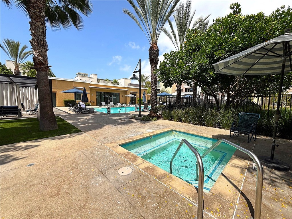 612 East Carson Street, Unit 303 Carson, CA 90745 - Photo 32 of 51 a view of swimming pool with outdoor seating and deck