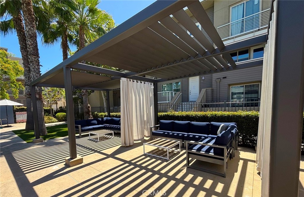 612 East Carson Street, Unit 303 Carson, CA 90745 - Photo 37 of 51 a building outdoor space with patio furniture