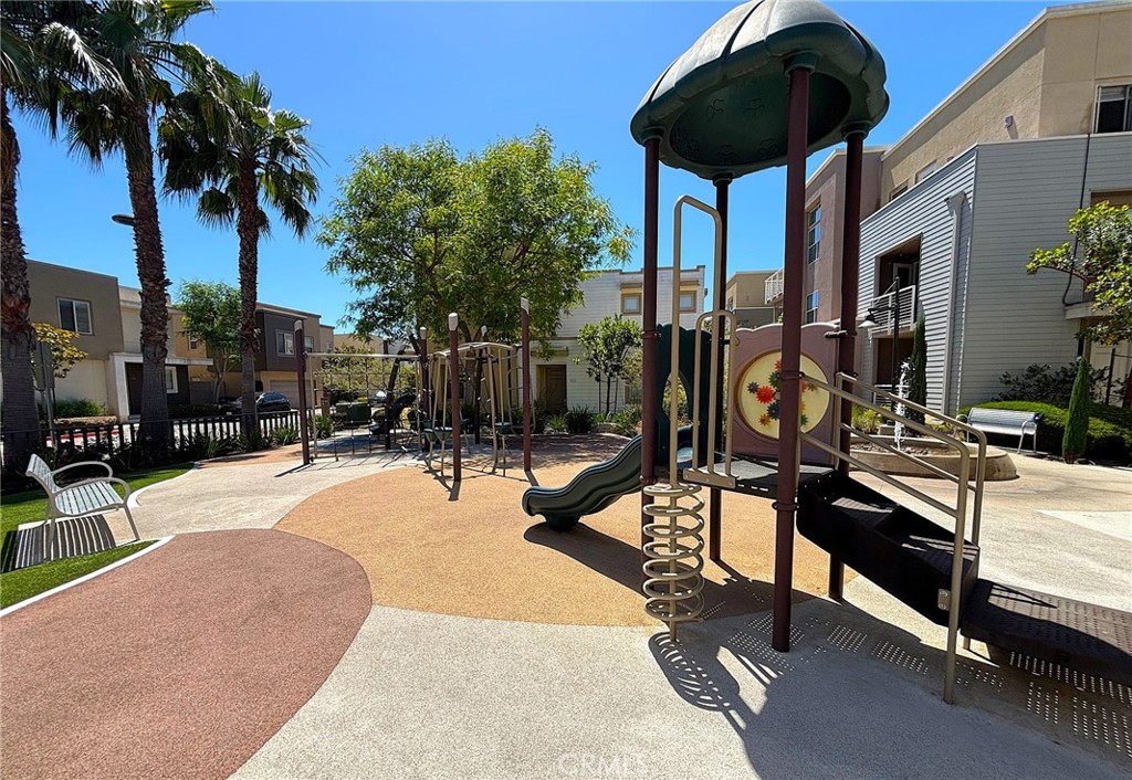 612 East Carson Street, Unit 303 Carson, CA 90745 - Photo 40 of 51 a view of a swimming pool with a patio