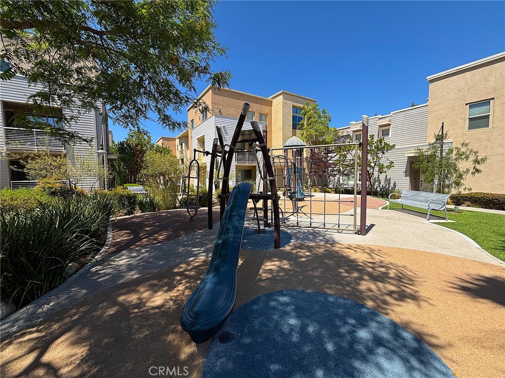 612 East Carson Street, Unit 303 Carson, CA 90745 - Photo 41 of 51 a view of a house with a yard