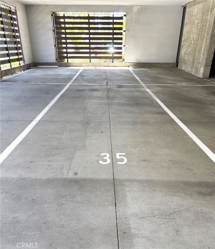 612 East Carson Street, Unit 303 Carson, CA 90745 - Photo 50 of 51 a view of an empty room with a fireplace