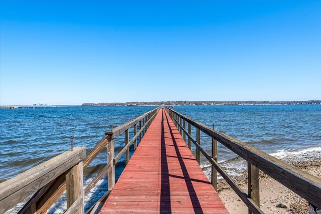 a view of wooden floor with a lake view