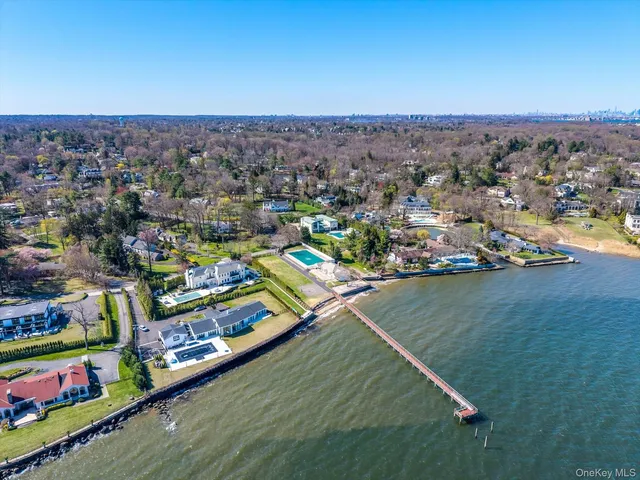 an aerial view of a houses with outdoor space