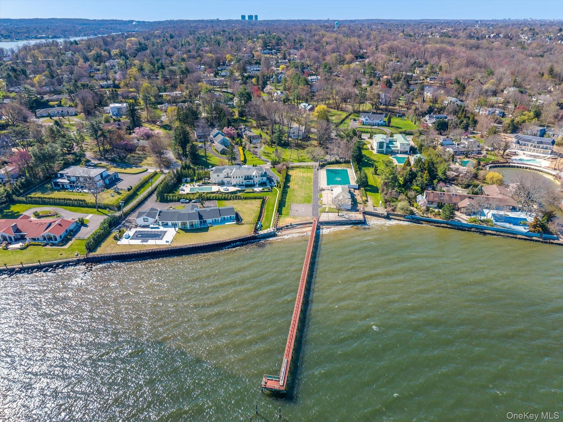 33 Harbour Road Great Neck, NY 11024 - Photo 3 of 14 an aerial view of residential houses with outdoor space and trees