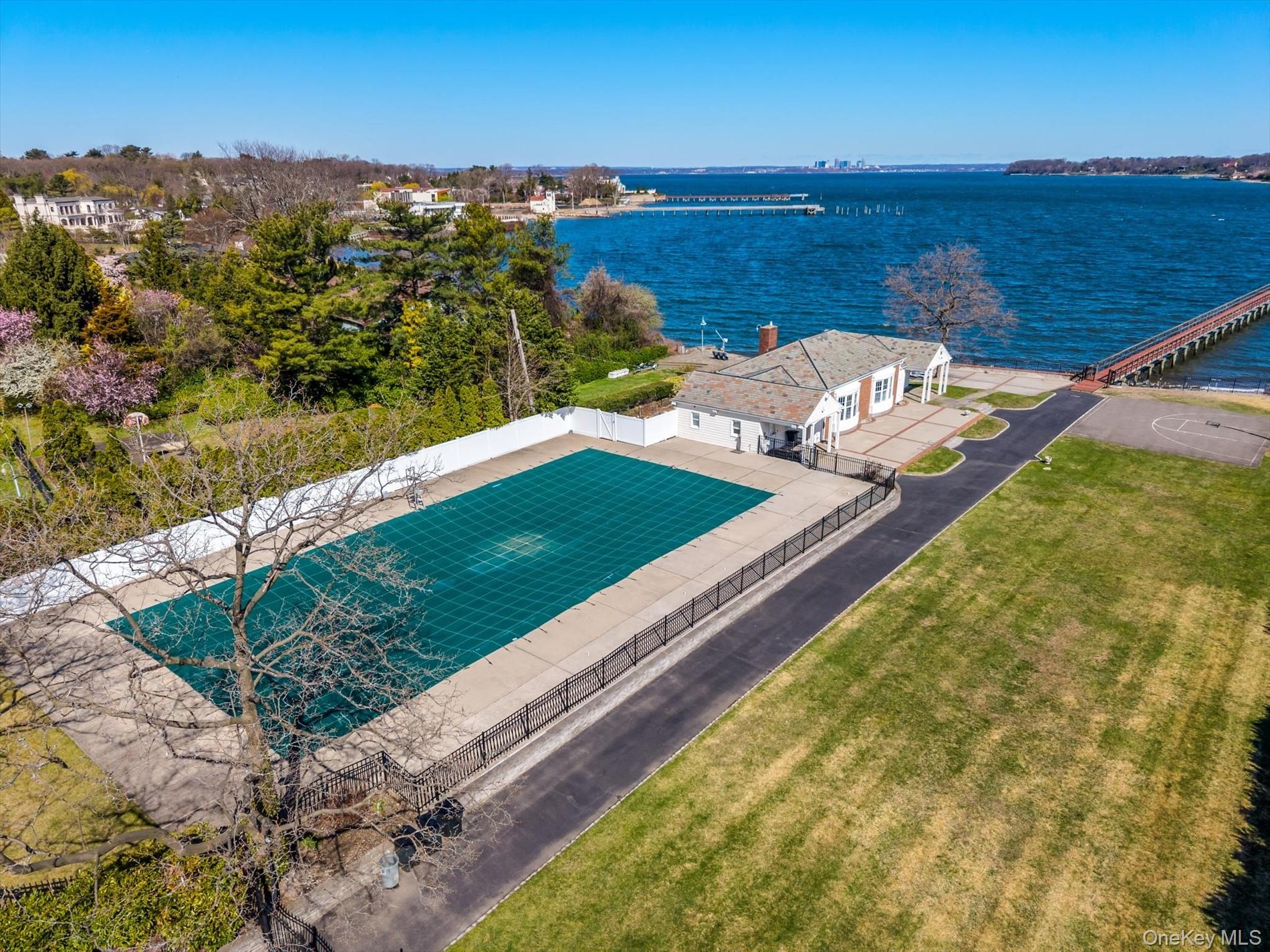 33 Harbour Road Great Neck, NY 11024 - Photo 4 of 14 a view of a lake with outdoor space