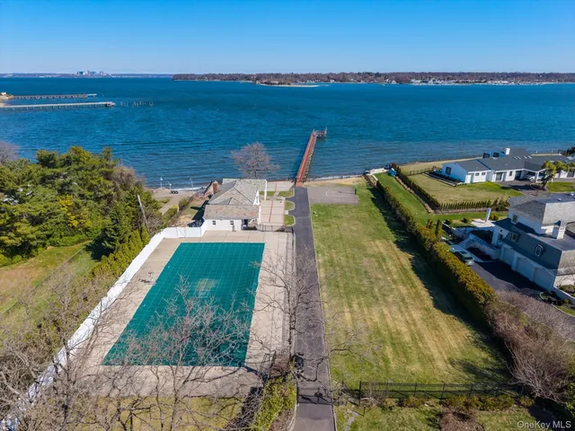 a view of a lake with a yard