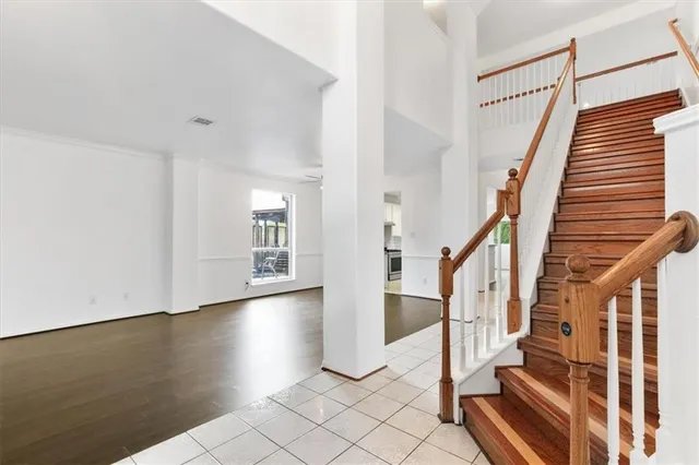 a kitchen with a sink a stove a refrigerator and cabinets