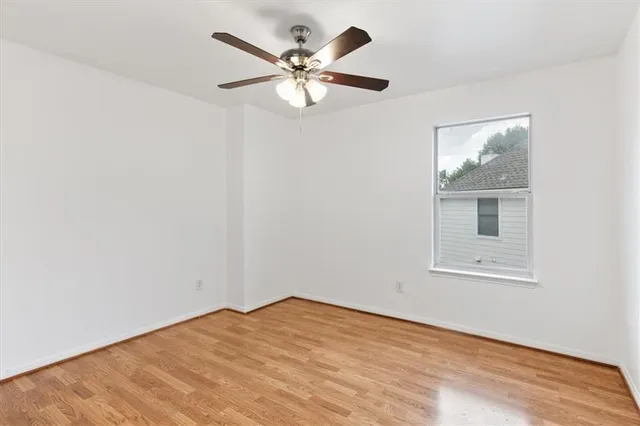 a view of a hallway with a white walls