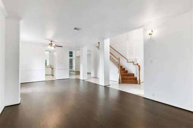 a view of an entryway with wooden floor