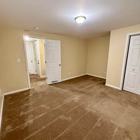 an empty room with a natural light