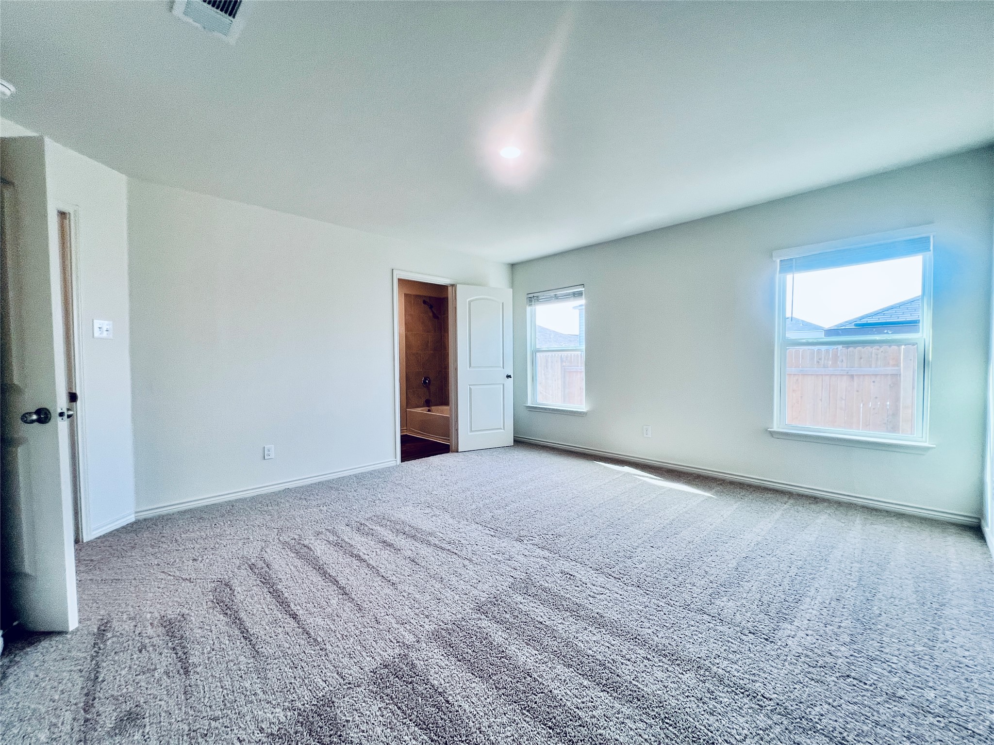 520 Locksley Cove Jarrell, TX 76537 - Photo 10 of 27 A spacious chamber provides abundant floor area for rest and rejuvenation.
