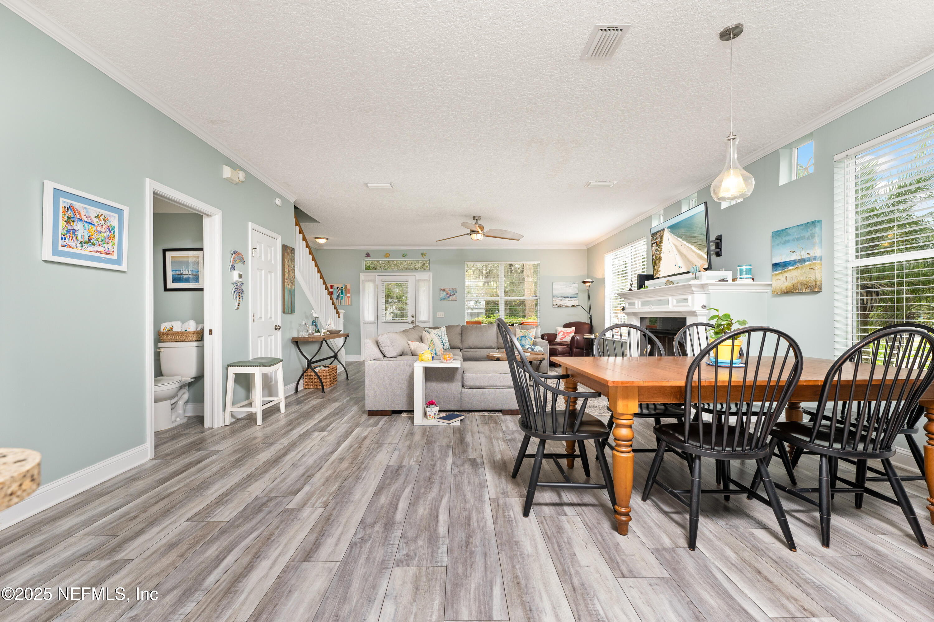 2500 Hydrangea Street St. Augustine, FL 32080 - Photo 15 of 56 a view of a a dining room with furniture window and wooden floor