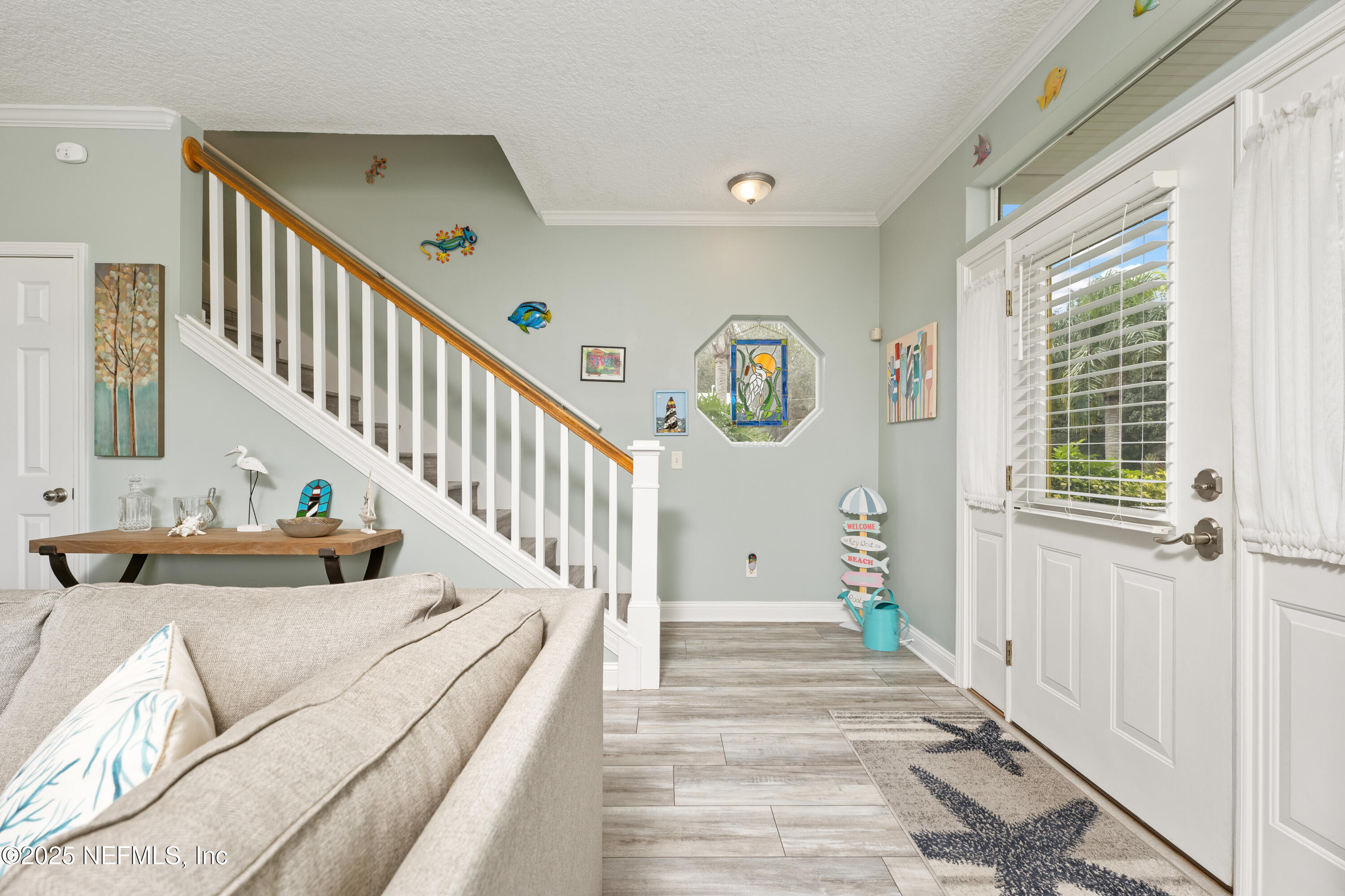 2500 Hydrangea Street St. Augustine, FL 32080 - Photo 20 of 56 a view of entryway and hall with wooden floor