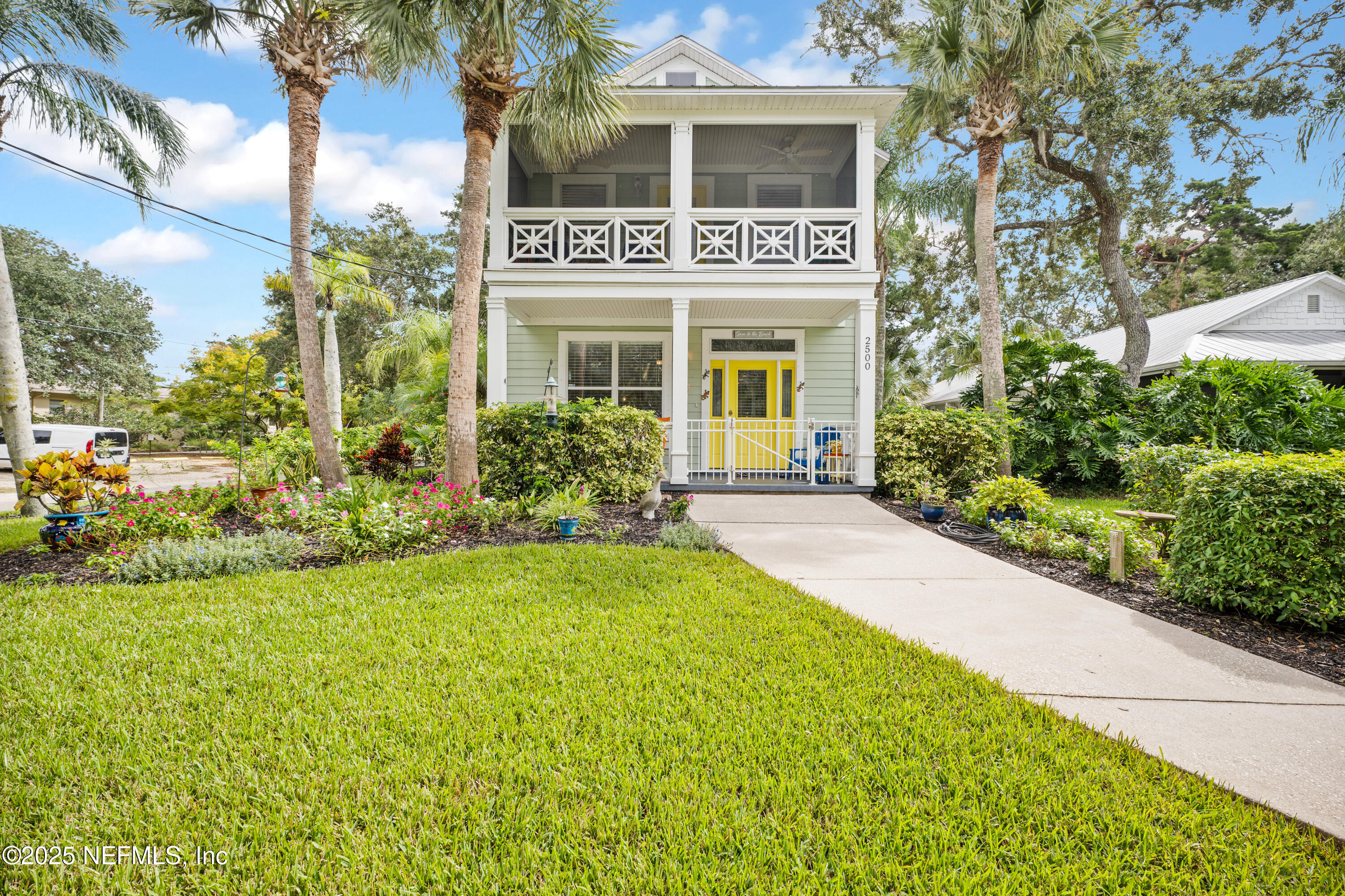 2500 Hydrangea Street St. Augustine, FL 32080 - Photo 2 of 56 a front view of a house with garden