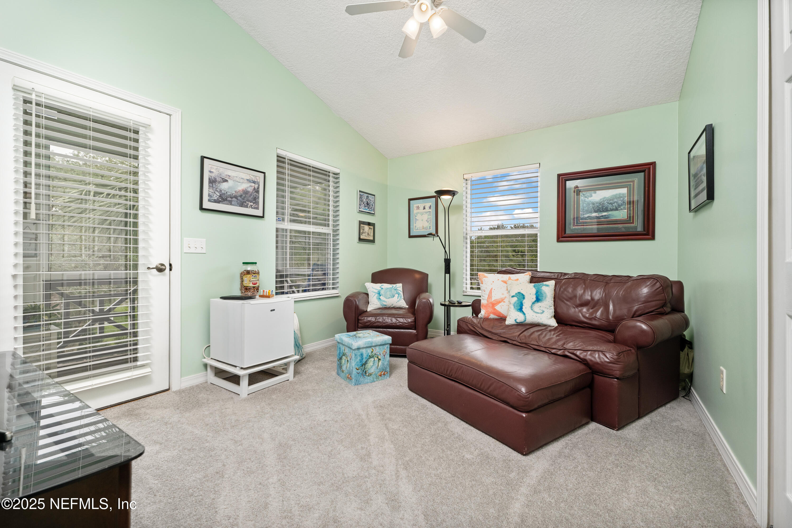 2500 Hydrangea Street St. Augustine, FL 32080 - Photo 30 of 56 a living room with furniture and a window