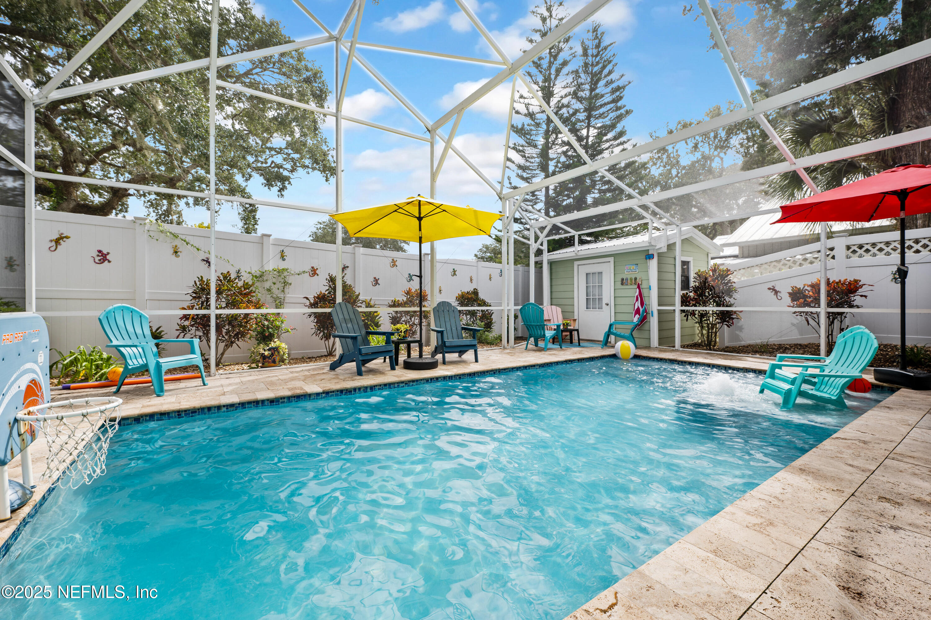 2500 Hydrangea Street St. Augustine, FL 32080 - Photo 3 of 56 a view of a swimming pool with a patio and a yard