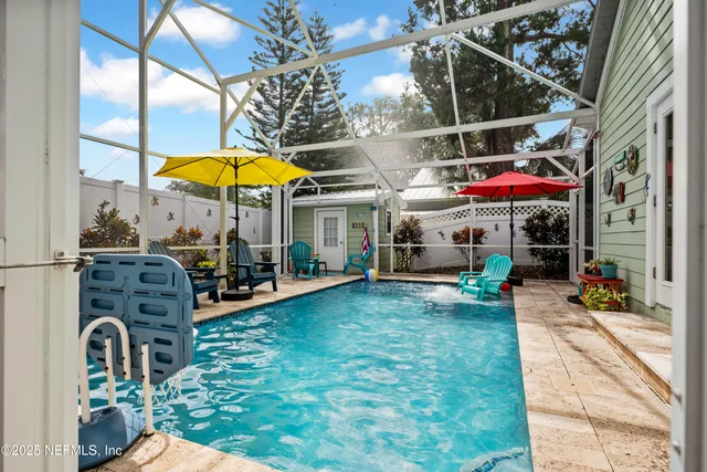 swimming pool with outdoor seating