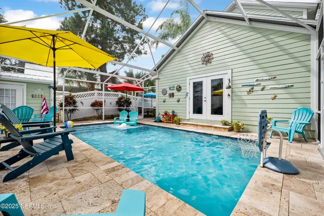an outdoor space with furniture and umbrella