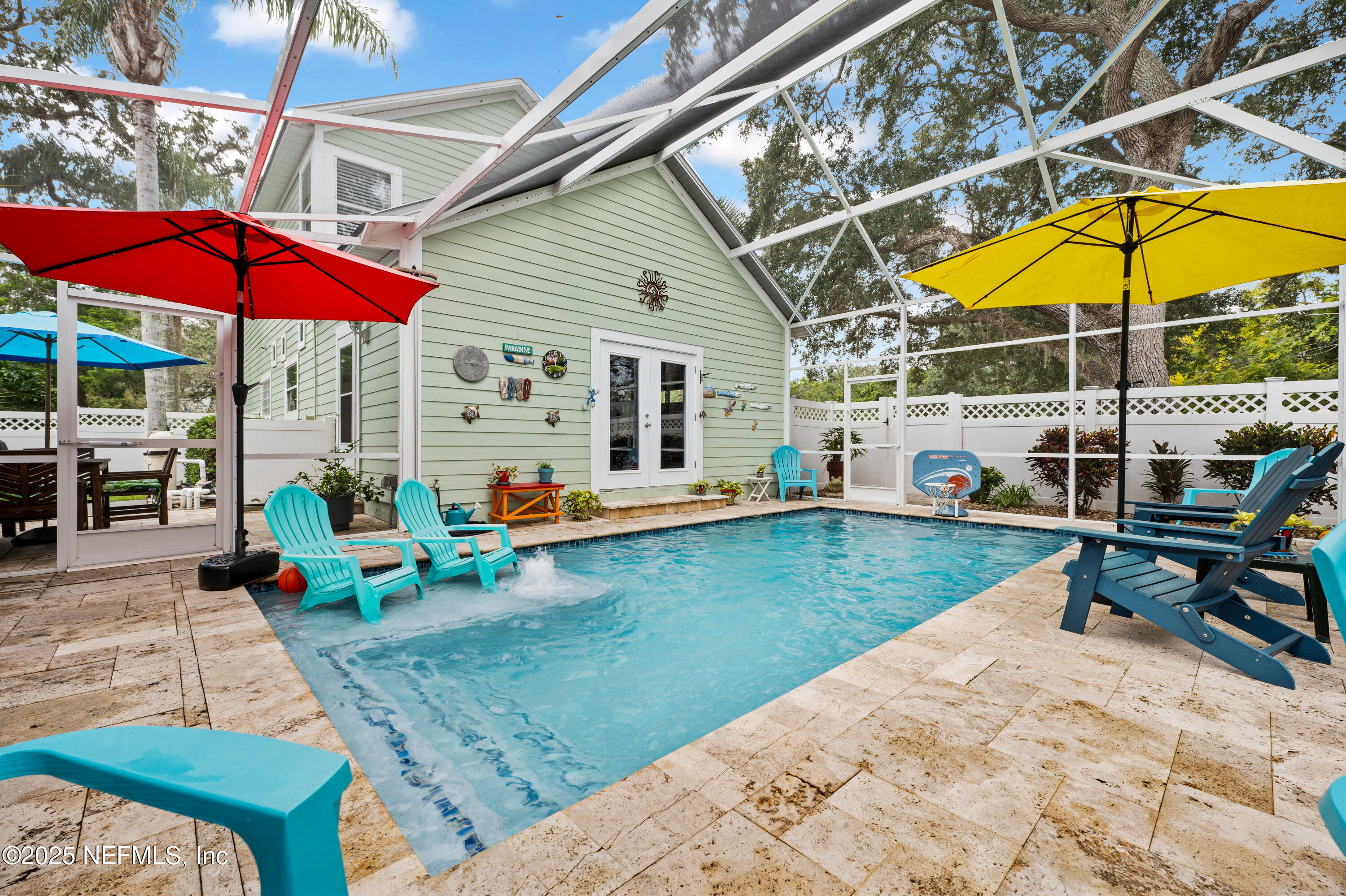 2500 Hydrangea Street St. Augustine, FL 32080 - Photo 38 of 56 an outdoor space with furniture and umbrella