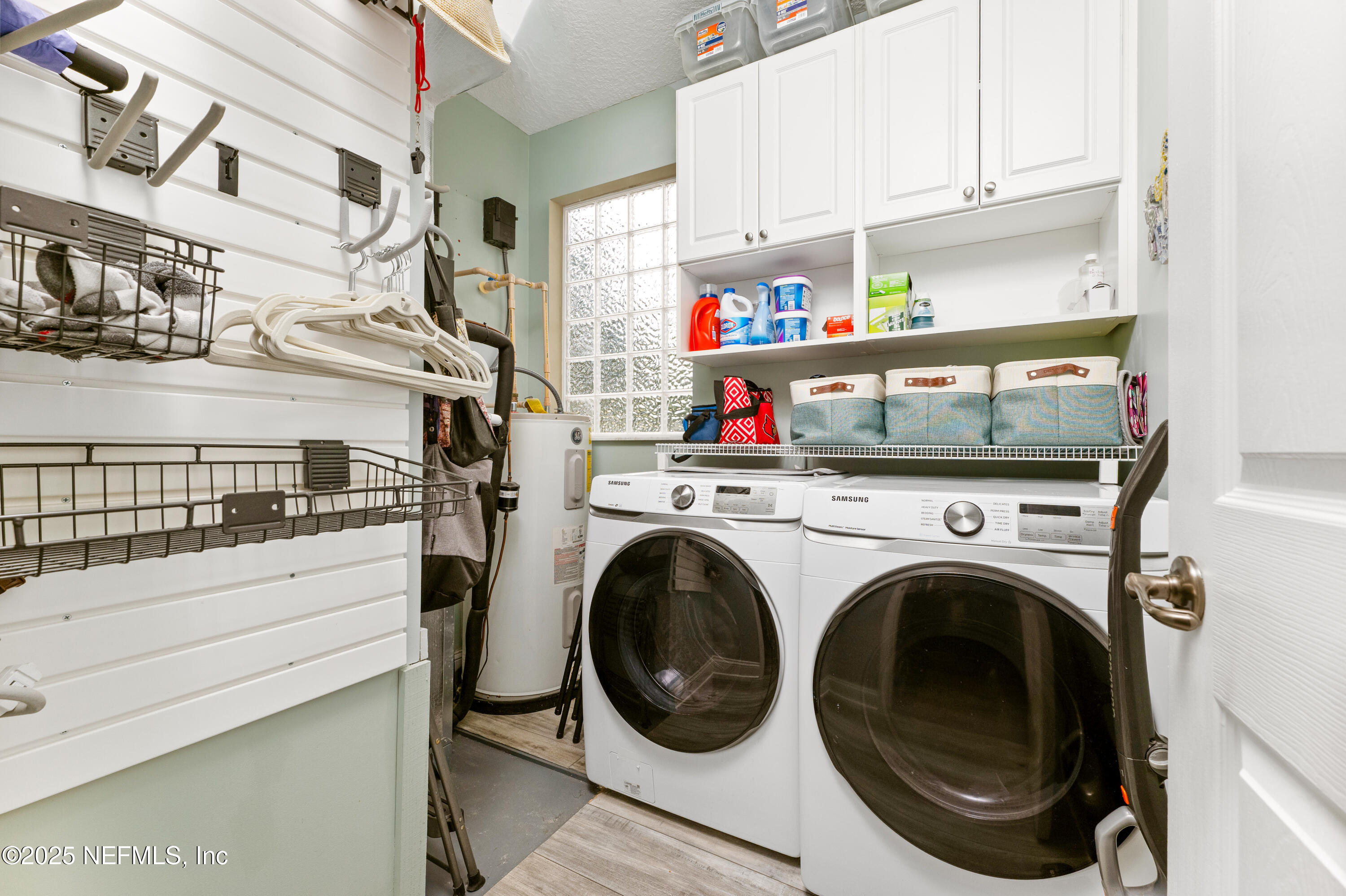 2500 Hydrangea Street St. Augustine, FL 32080 - Photo 46 of 56 a utility room with dryer and washer