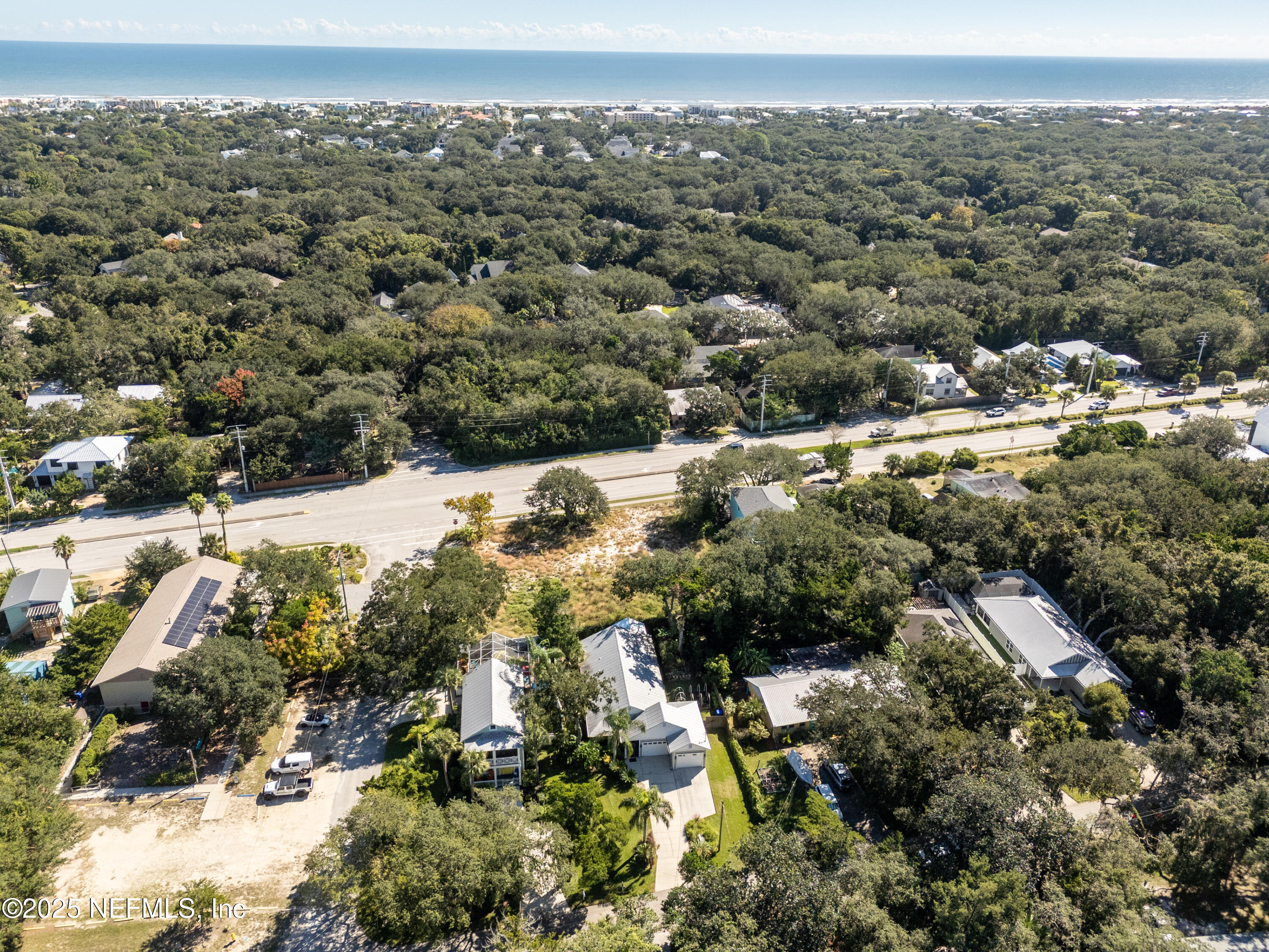 2500 Hydrangea Street St. Augustine, FL 32080 - Photo 52 of 56 an aerial view of residential houses with outdoor space and trees