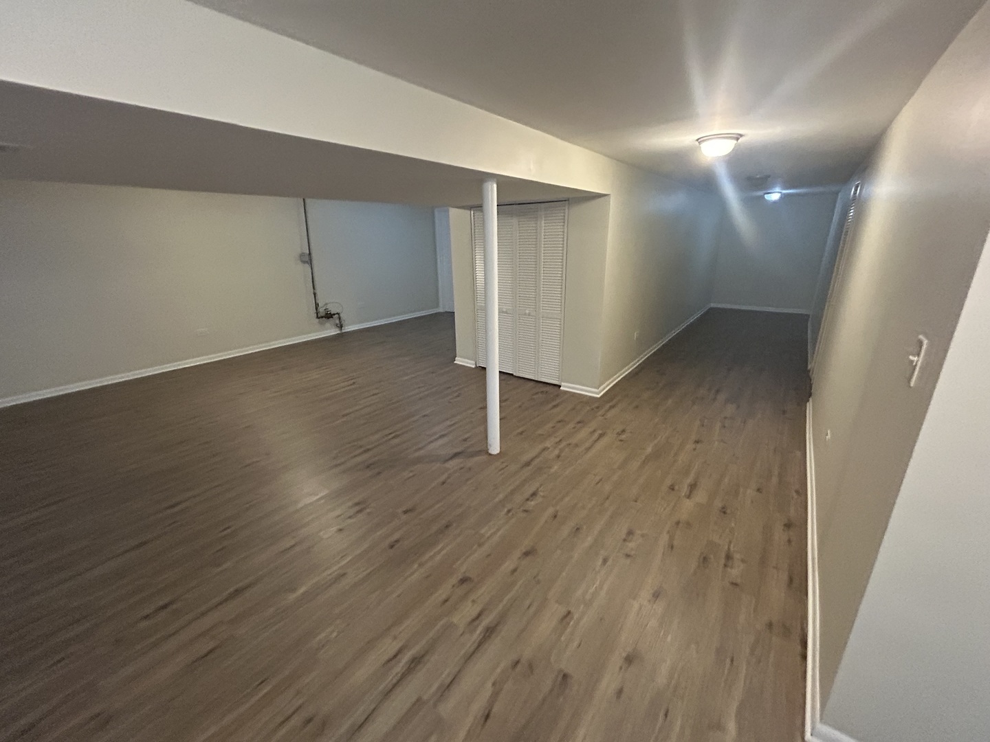 537 Nathan Road University Park, IL 60484 - Photo 17 of 27 an empty room with wooden floor and windows