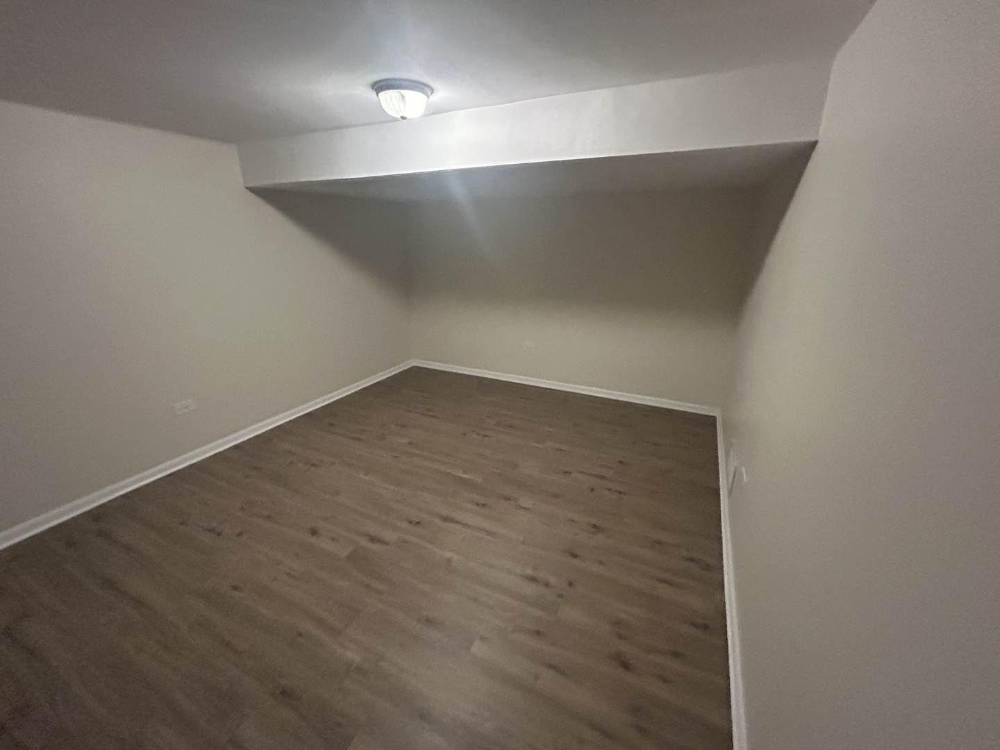 537 Nathan Road University Park, IL 60484 - Photo 20 of 27 an empty room with wooden floor